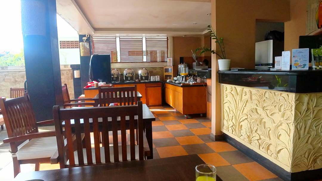breakfast area at Sari Villa Sanur Bali with outdoor seating and bain maries